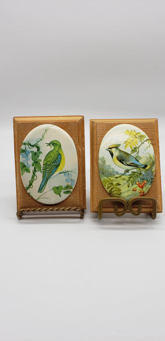 Pair of Oval Bird Wall Plaques on Wood
