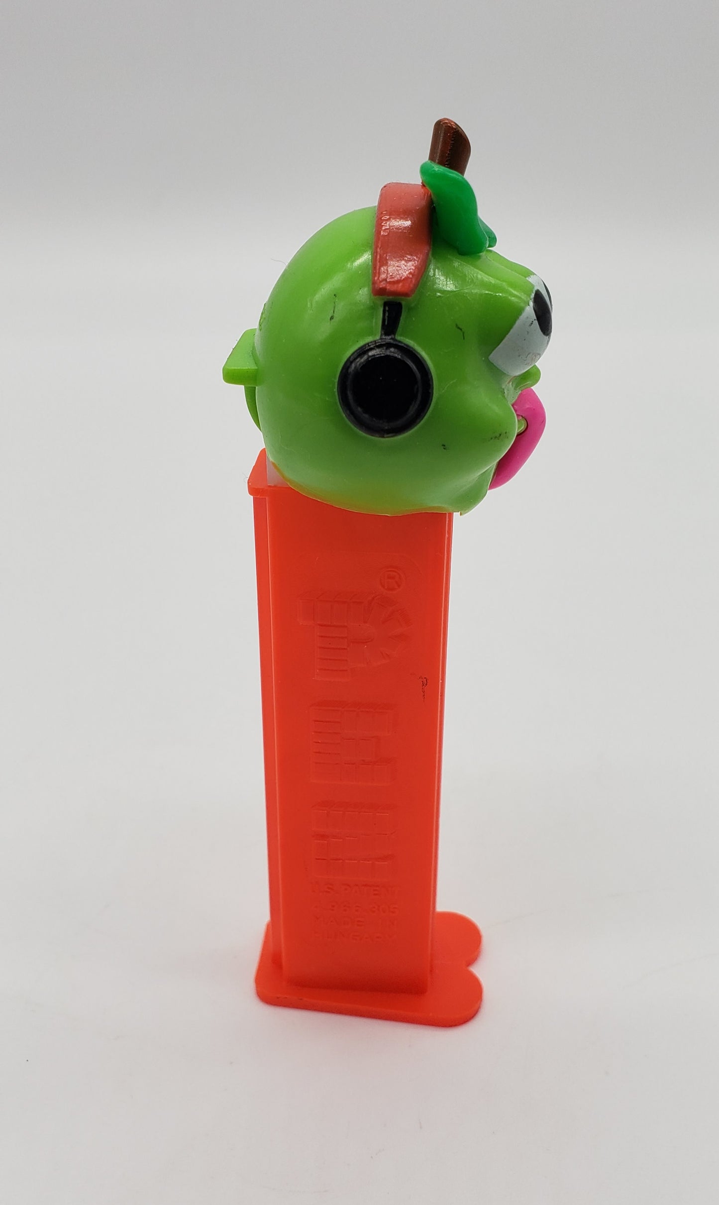 Goofy Green Apple Head Headphones Tongue Pez Dispenser
