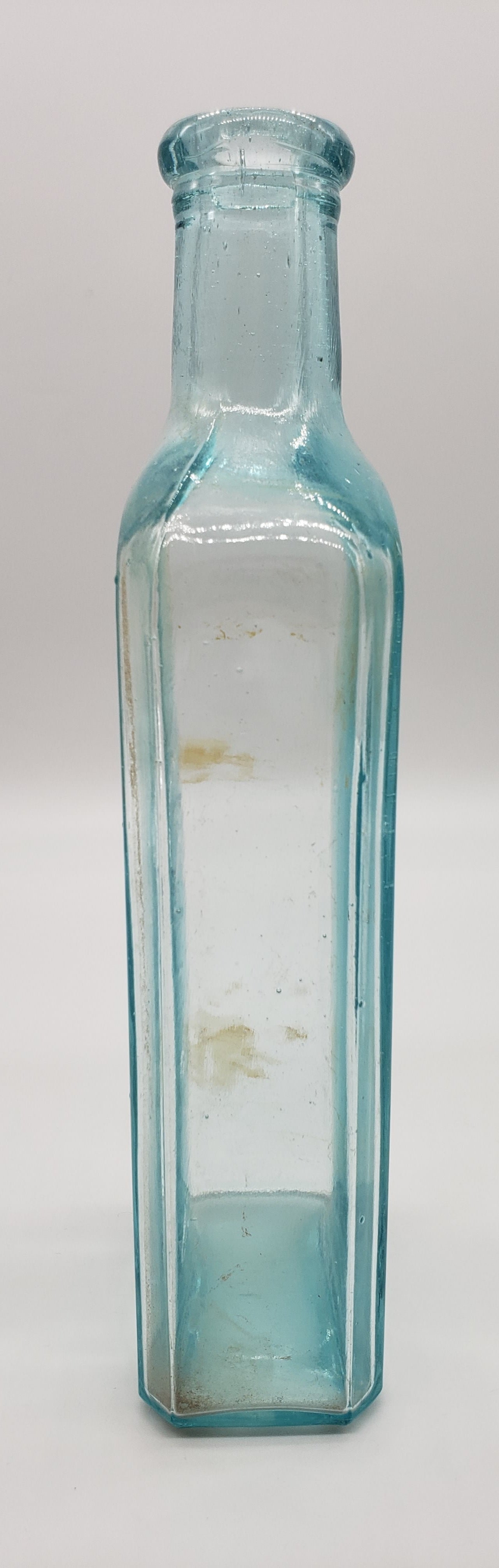 Rawleigh’s Glass Medicine Bottle