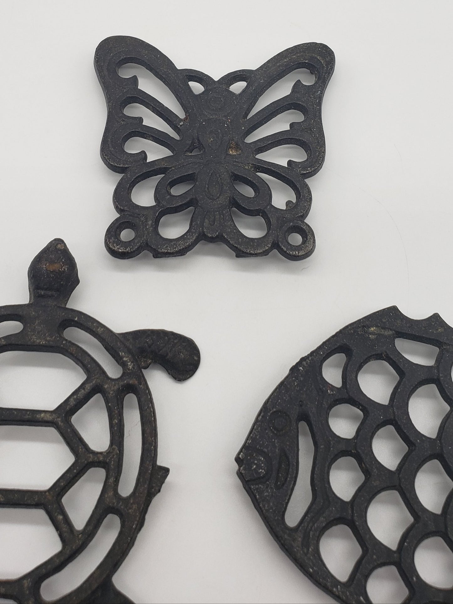 Set of three metal trivets - petite size - butterfly, fish, turtle