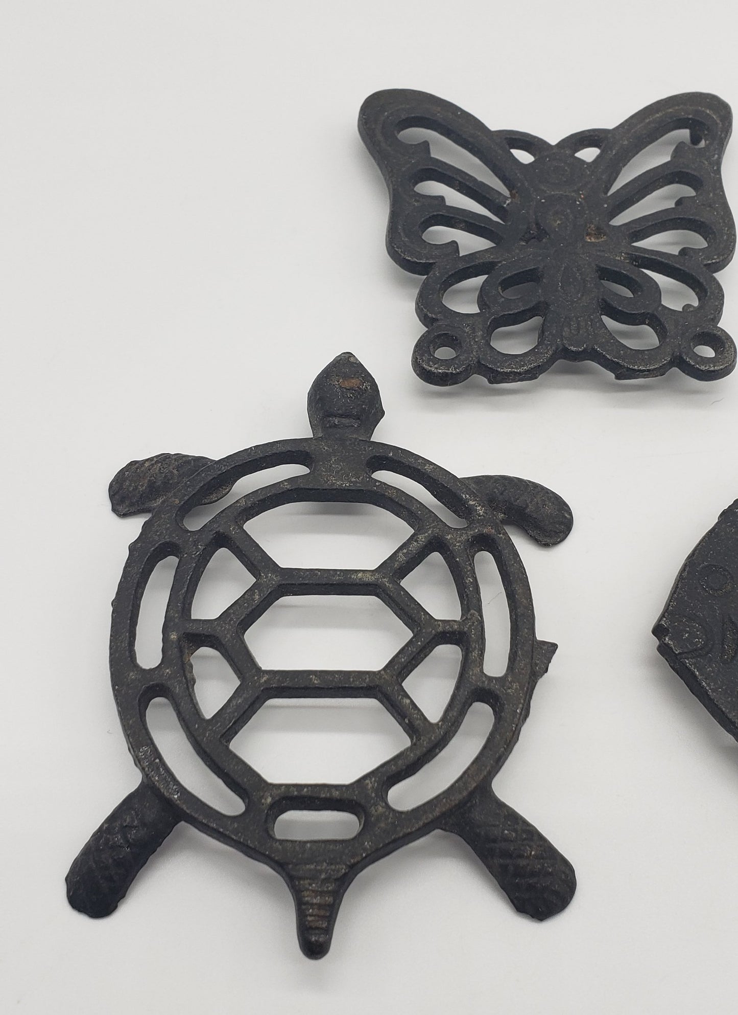 Set of three metal trivets - petite size - butterfly, fish, turtle