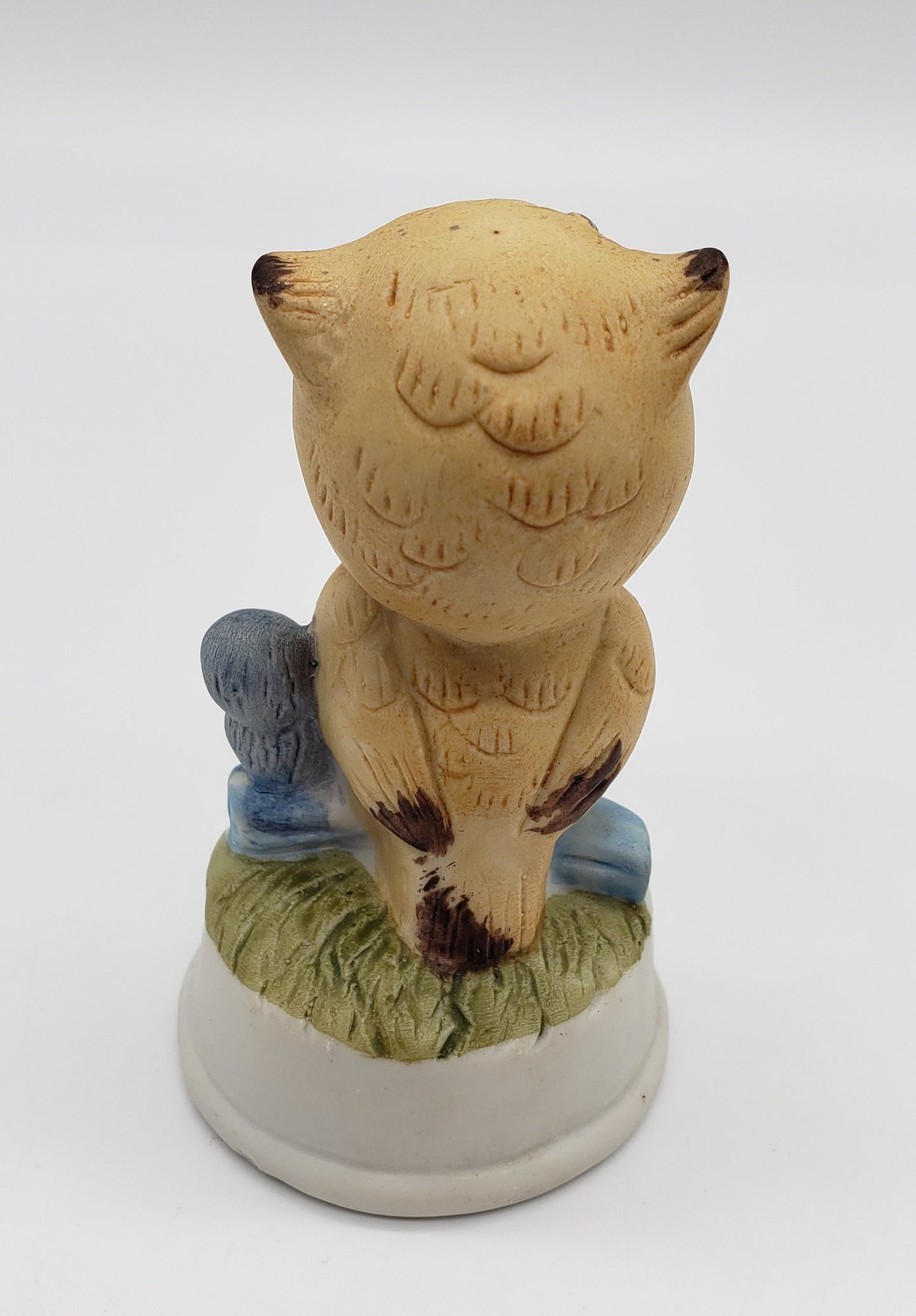 Owl Figurine on log