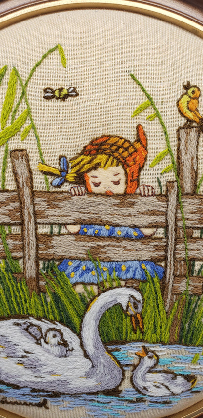 Hummel needlework picture of a Girl looking at a Swan