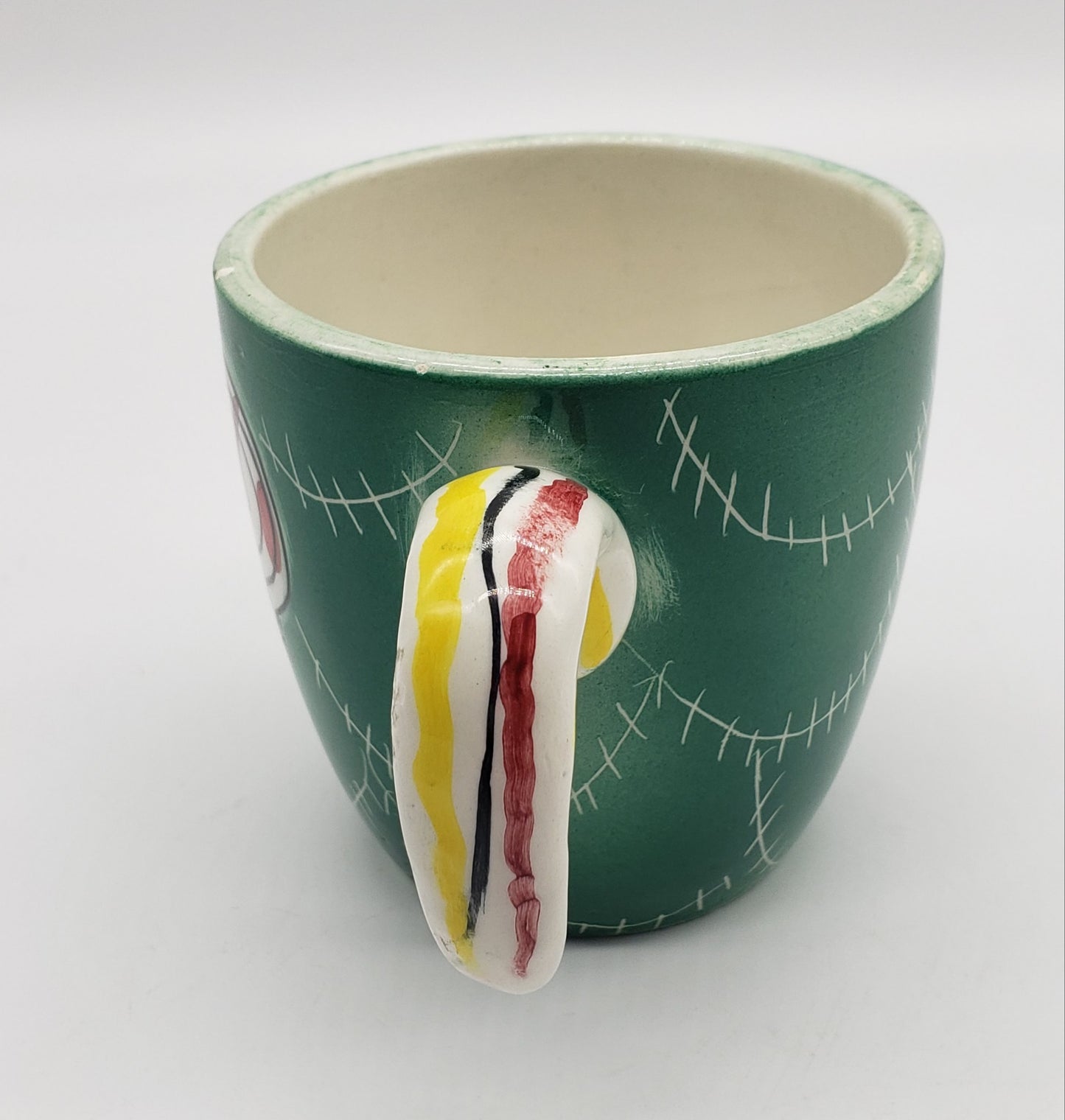 Italian hand painted pottery cup with hook handle