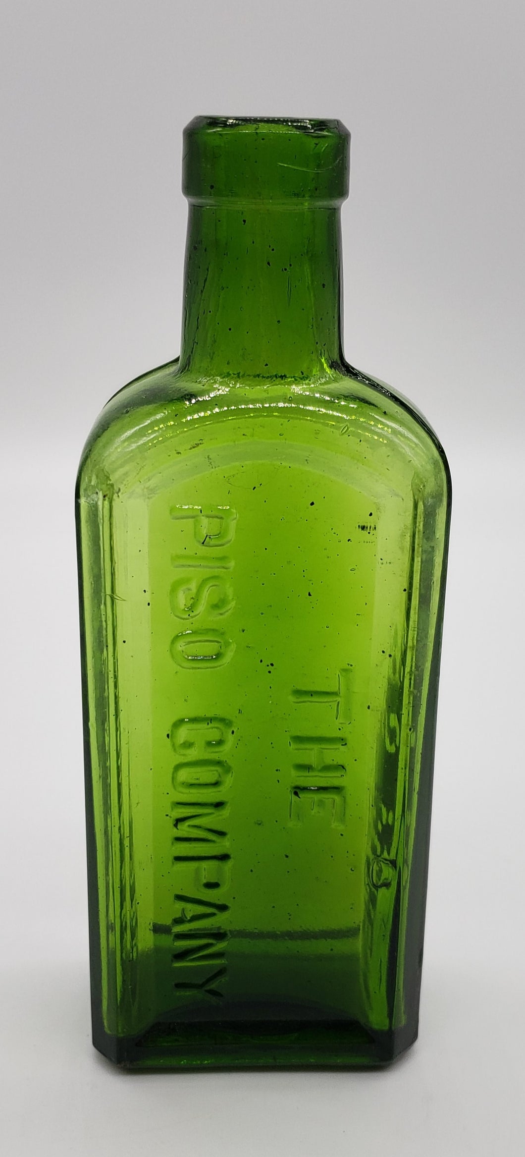 Piso's Cure Glass bottle
