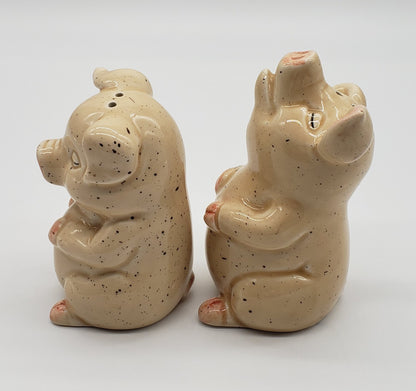 Pigs with closed eyes salt and pepper shakers