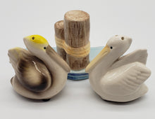 Load image into Gallery viewer, Beachcombers Coastal Pelicans on Water Near Pilings Salt and Pepper Shaker Set
