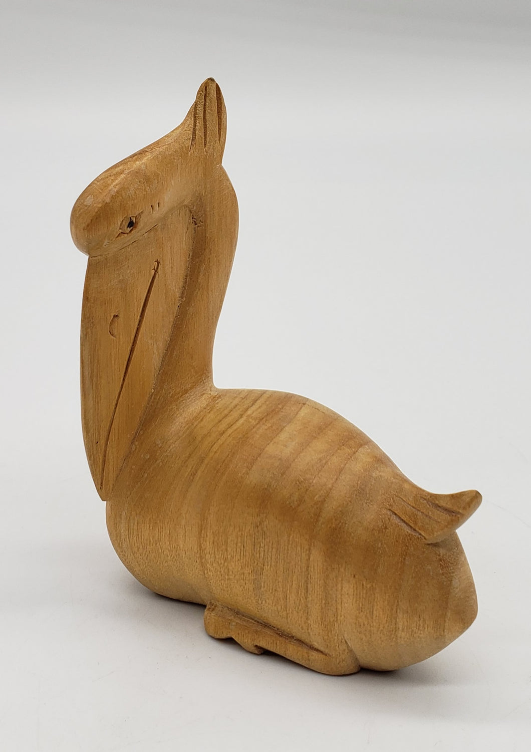 Hand Carved Wooden Pelican Figurine